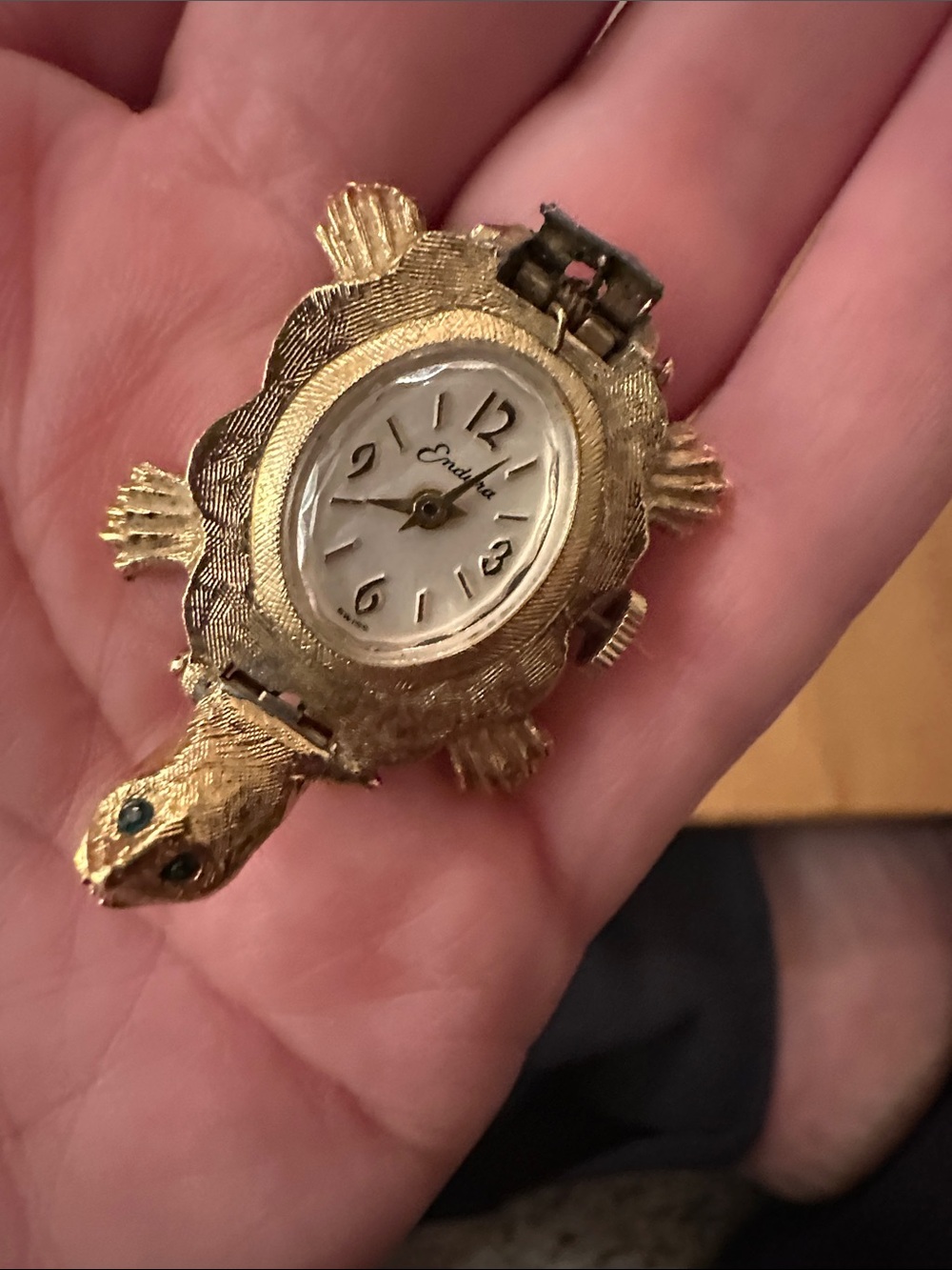 vintage Endura turtle watch is made of gold-toned base metal